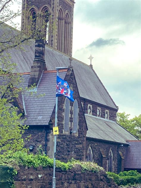 Loyalist flags erected outside Catholic Church in North Belfast