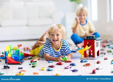 Kids Play with Toy Cars. Children Playing Car Toys Stock Photo - Image ...