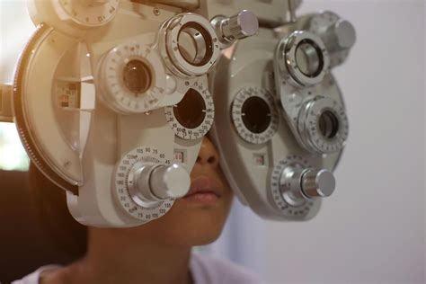 Child eye exam, kid eye test, Phoropter eye test 42334058 Stock Photo ...