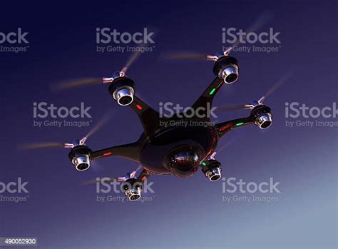 Drone With Surveillance Camera Flying In Night Sky Stock Photo ...