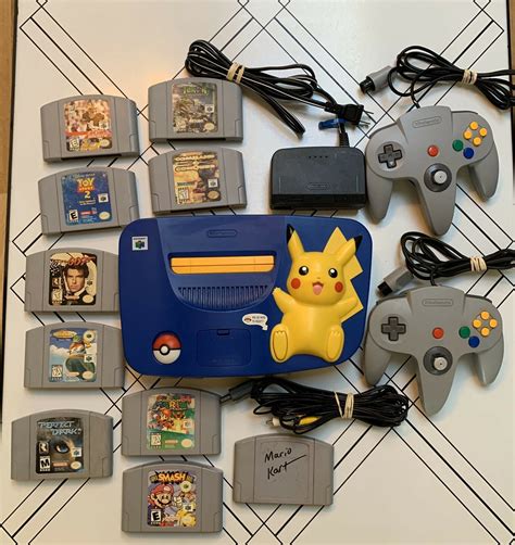 Nintendo 64 Pokemon Pikachu 2 Controllers 10 Video games - iCommerce on Web