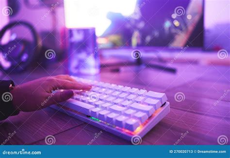 PC Keyboard, Gaming and Hand for Video Game, Online Streaming and Gamer Room in Neon Light ...