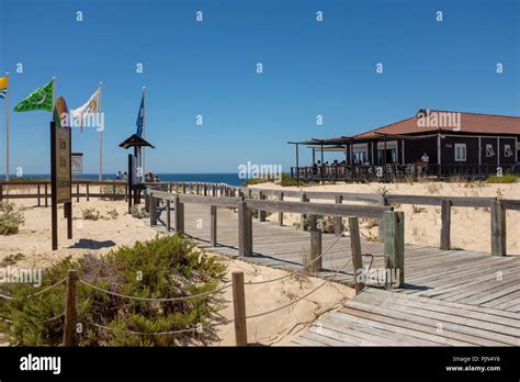 The public boardwalk leading down to Praia do Pego (Pego Beach), past Restaurante Sal, in ...