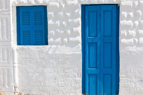Blue Door And White Wall Free Stock Photo - Public Domain Pictures
