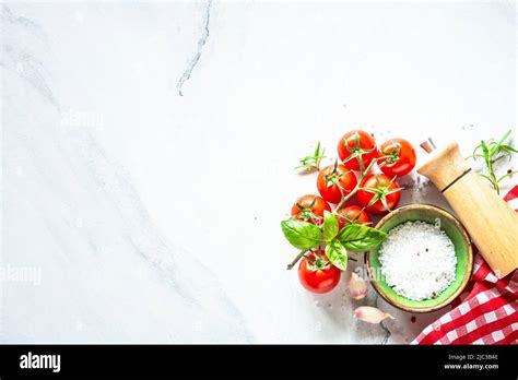 Food cooking background on white marble table Stock Photo - Alamy