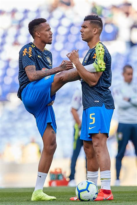 Eder Militao of Brazil and Carlos Casemiro of Brazil warm up prior to... | Sports images, Soccer ...