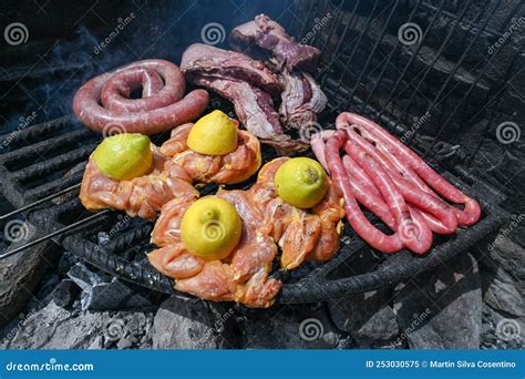 Typical Uruguayan and Argentine Asado Cooked on Fire. Entrana and Vacio ...