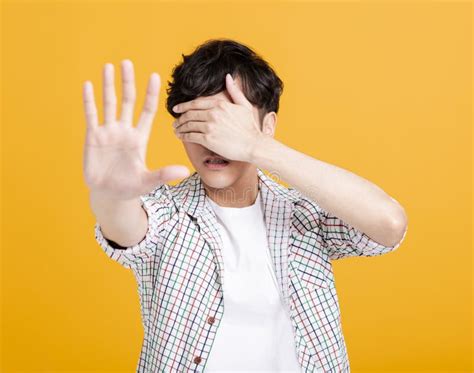 Scared Young Man Hand Cover Eyes with Stop Sign Stock Image - Image of ...