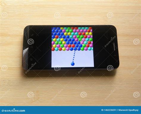 Bubble Shooter app editorial stock image. Image of devices - 146223659