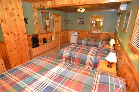 Lodge Room #6 has knotty pine walls and ceilings, 2 twin beds and 1 ...