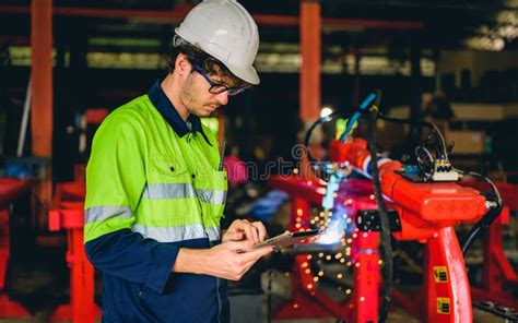 Portrait of Happy Male Mechanical Engineer in White Hard Hat and Safety ...