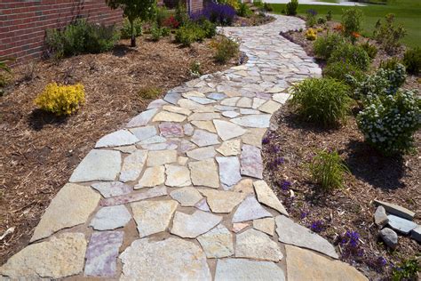 Build Your Own Natural Stone Sidewalk | Stone landscaping, Stone walkway, Diy stone walkway