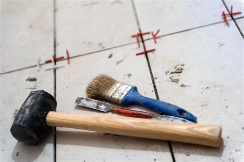 Ceramic tiles and tools for tiler 10745977 Stock Photo at Vecteezy