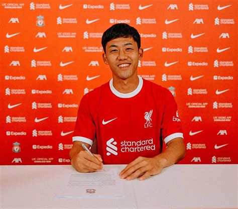 In photos: Wataru Endo's Liverpool signing day at the AXA Training Centre - Liverpool FC