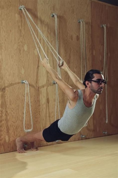 5 Reasons To Try Rope Wall Yoga - mindbodygreen