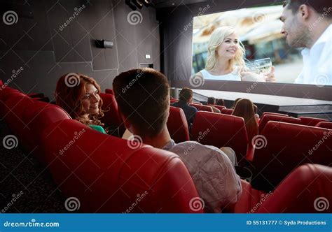 Happy Couple Watching Movie And Talking In Theater Stock Photo - Image ...