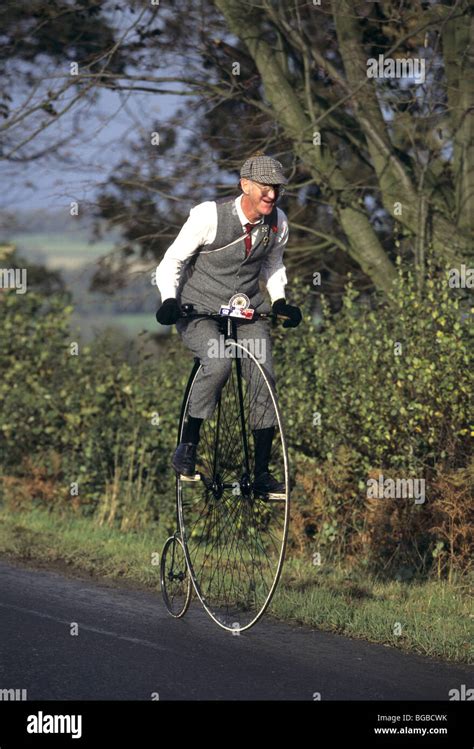 Man riding penny farthing hi-res stock photography and images - Alamy