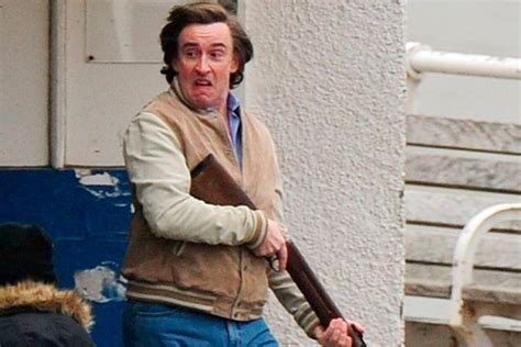 First picture from 'The Alan Partridge Movie' shows Steve Coogan brandishing a rifle