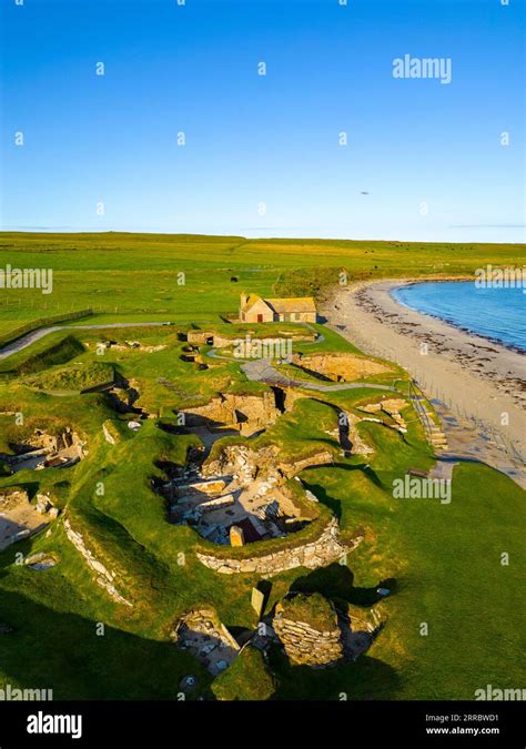 Aerial view of Skara Brae stone-built Neolithic settlement, located on the Bay of Skaill , west ...