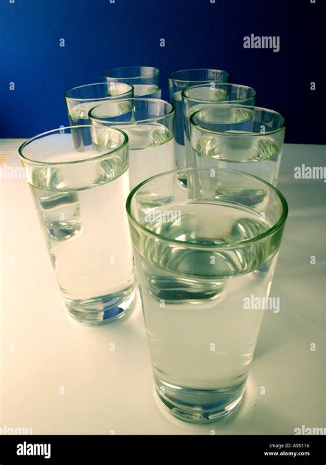 Eight glasses of water Stock Photo - Alamy