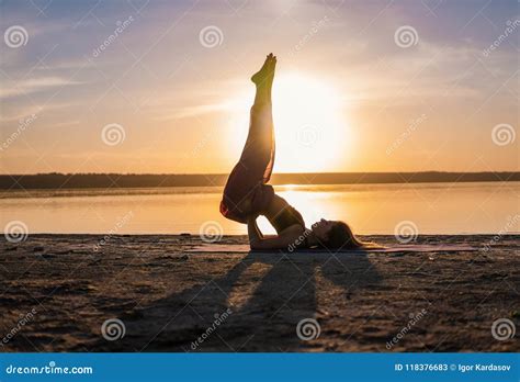 Silhouette Yoga Woman on the Beach at Sunset. Stock Image - Image of meditating, determination ...