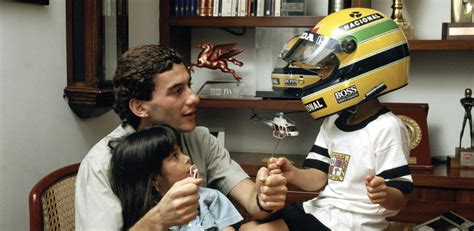 Ayrton Senna with his family and his son wearing his iconic yellow ...