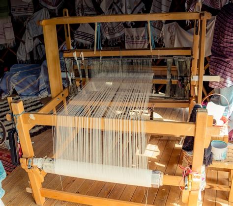 Premium Photo | Carpet of traditional types on a loom