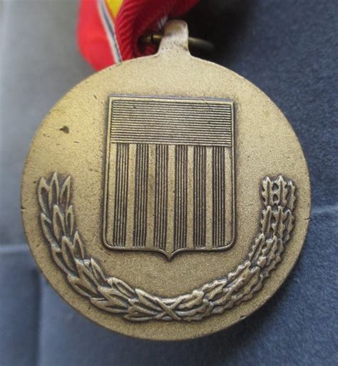 National Defense Medal with Unmatched Ribbon Bar, Pin