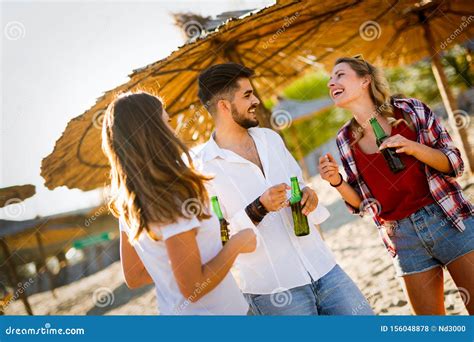 Happy Friends Laughing and Smiling Outdoors Stock Photo - Image of couple, lifestyle: 156048878