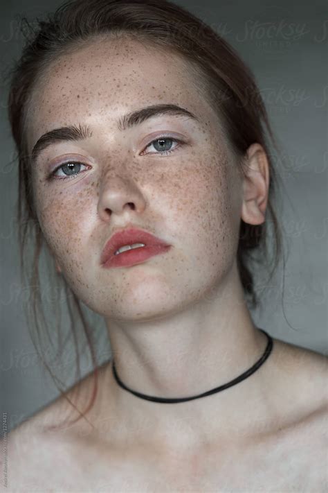 "Face Of A Beautiful Girl With Freckles Close-up" by Stocksy Contributor "Andrei Aleshyn" - Stocksy