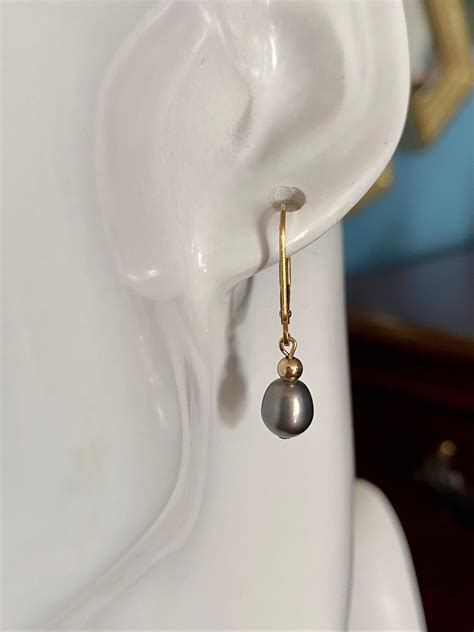 Freshwater black pearl dangle earrings on 14k yellow gold filled lever backs