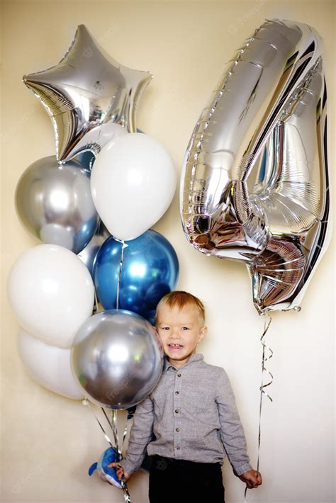 Premium Photo | Happy birthday boy with balloons at home