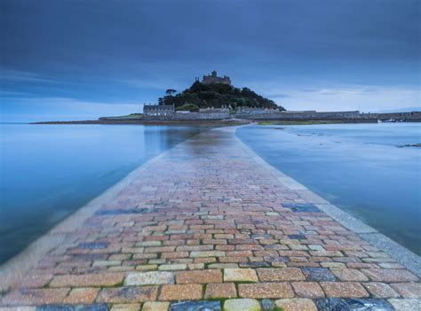 St Michael's Mount in Cornwall is a medieval castle encircled by sea, once home to a giant who ...