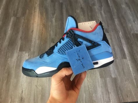 Travis Scott x Air Jordan 4 "Houston Oilers" In Hand - JustFreshKicks