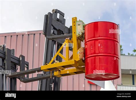 Forklift Drum Attachment Barrel Grabber Device Industrial Equipment Stock Photo - Alamy