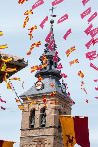 Premium Photo | Clock and bell tower in a medieval spanish city