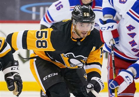 Penguins' Kris Letang out for Monday's game, still being evaluated ...