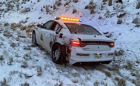 2 police cars among several hit along snow-covered Utah highway