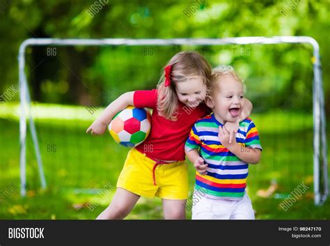 Kids Playing Football Image & Photo (Free Trial) | Bigstock