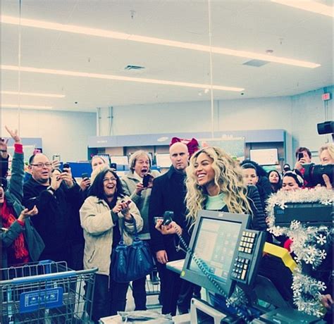 Beyonce surprises fans by going Christmas shopping at Walmart... for her own album | Daily Mail ...