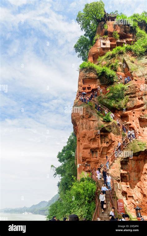 Leshan, China - September 28, 2017: Tourists going down stairs to the Leshan Giant Buddha Stock ...