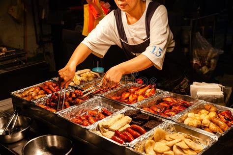 A Woman Sells Traditional Chinese Snacks at the Street Market Editorial ...