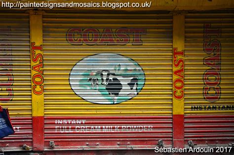 Painted signs and mosaics: Coast Instant Full Cream Milk Powder, Kathmandu