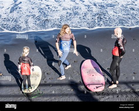 Surfing. Surfers and surf school on Las Canteras beach in Las Palmas ...