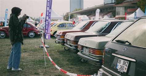 Photographer Taking Photos of Classic Mercedes Exhibited at a Car Show ...