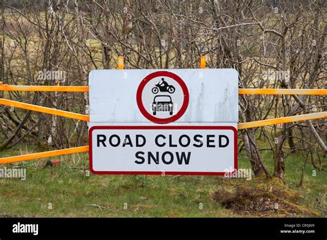 road closed due to snow roadsign and barrier on the a85 in scotland perth to crianlarich road ...