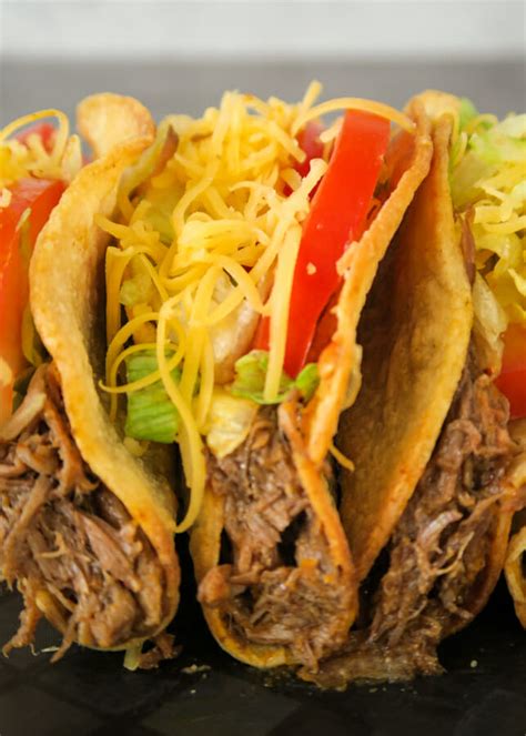 Crispy Shredded Beef Tacos {with Baked Taco Shells} - That's Deelicious!