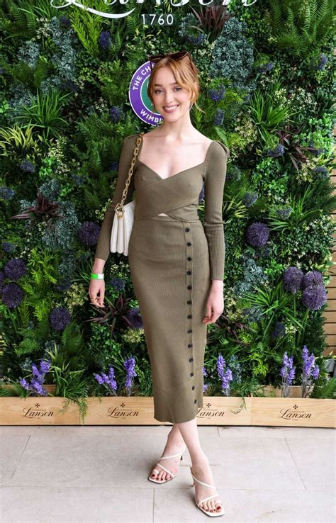 Phoebe Dynevor in an Olive Dress Attends the Lanson Champagne Presentation at the Championships ...