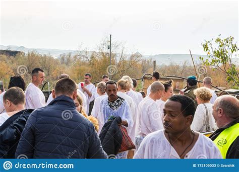 Believers Arriving at the Epiphany Rite Use Holy Water for Ablution from the Jordan River on the ...