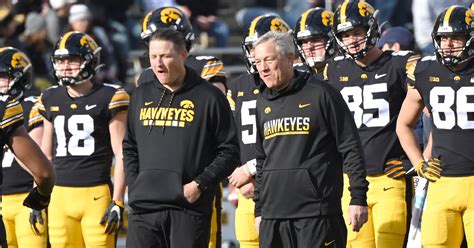 Kirk Ferentz reveals why his son, Brian, received the smallest salary bump among Iowa assistants ...